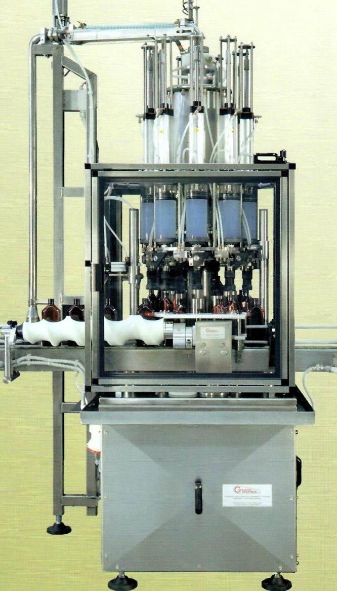 Riempitrice rotativa per il riempimento di più flaconi.